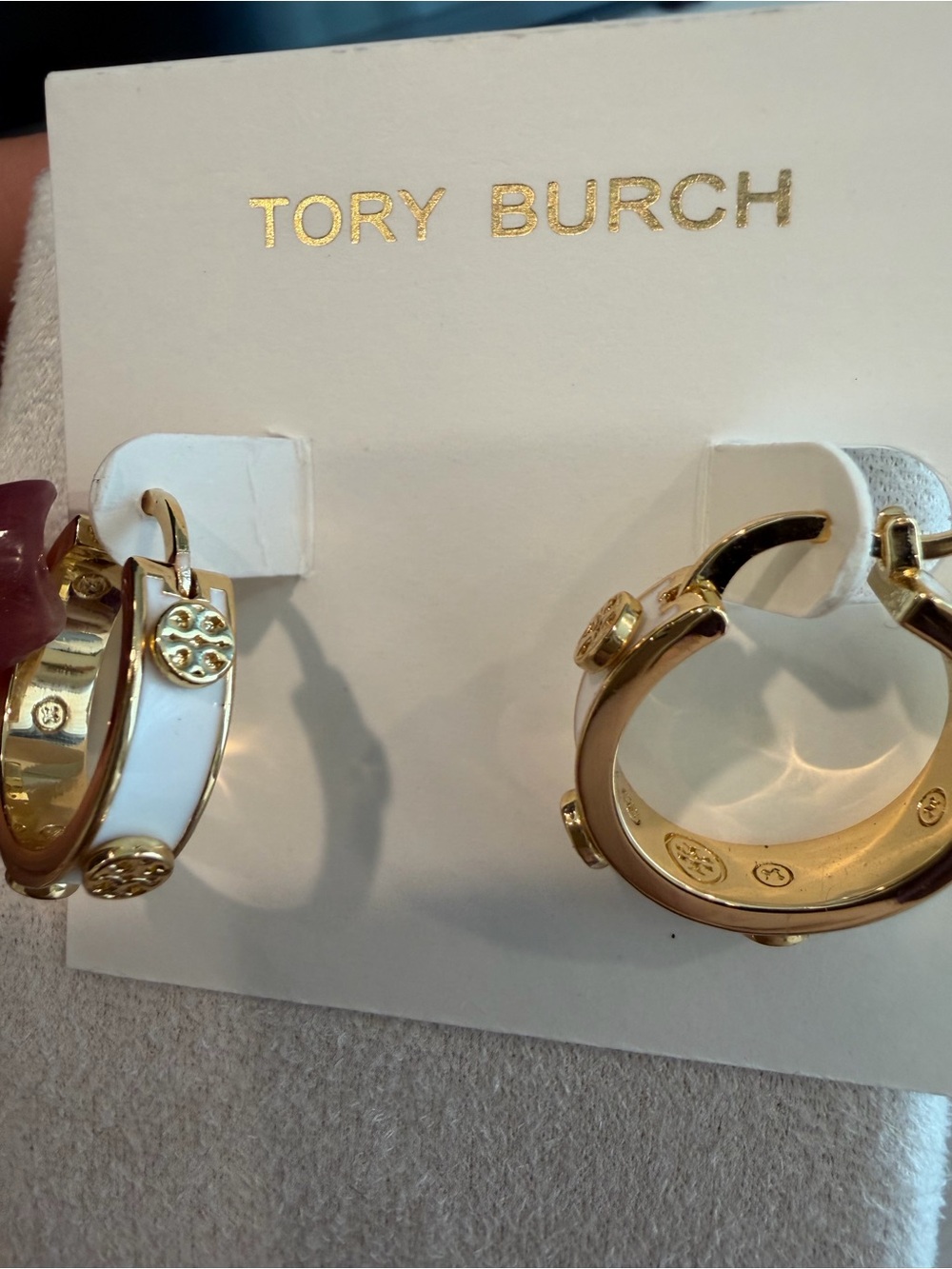Tory Burch White Enamel and Gold Logo Huggie Earrings